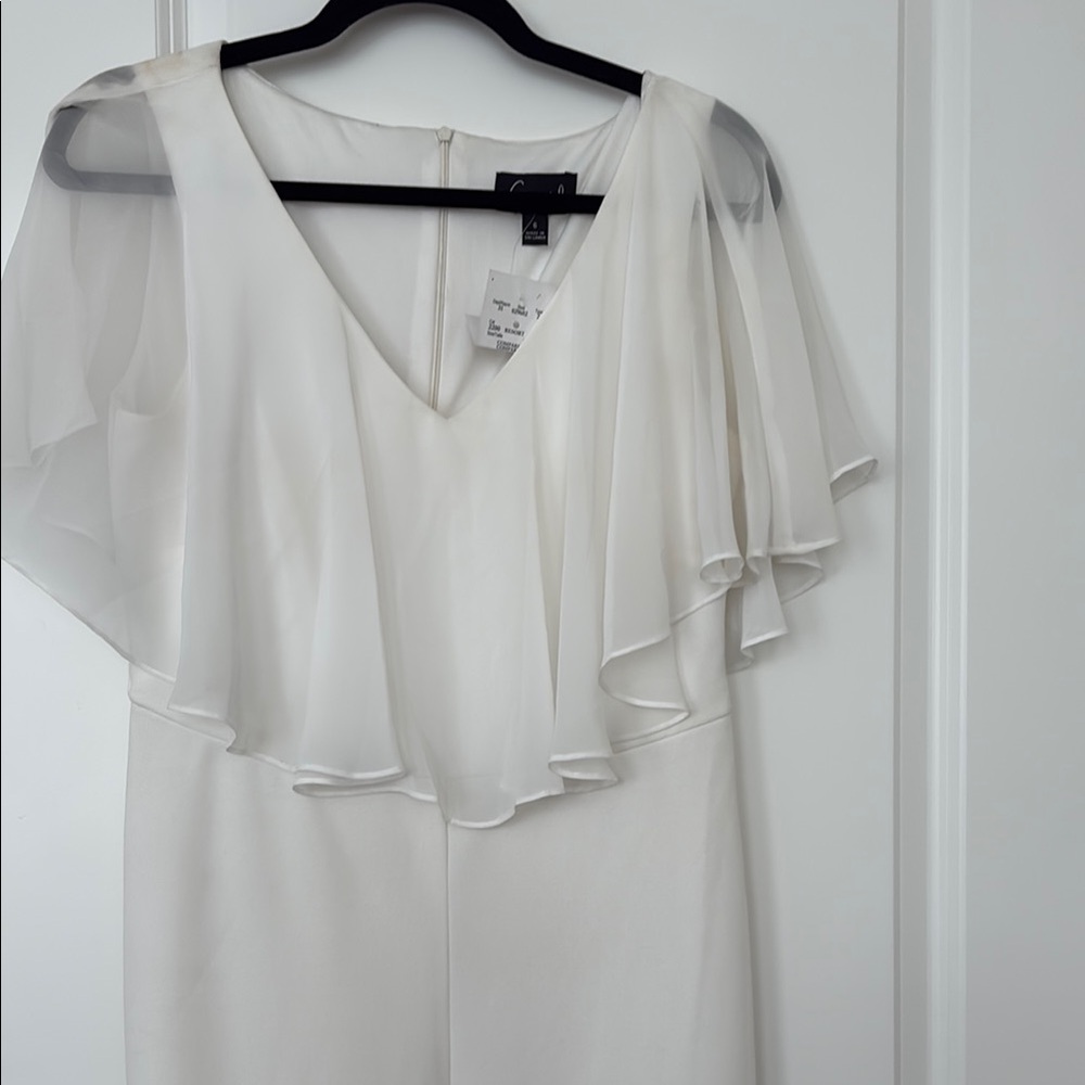 White Jumpsuit with sheer cape effect sleeves